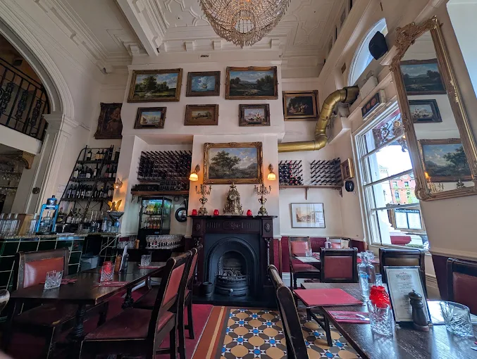 Main dining room with Victorian fireplace at Millstone Restaurant